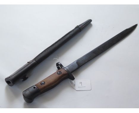Bayonet: A good India Pattern MKII short SMLE bayonet. Unfullered blade 12". Ricasso marked 'N.W.R'. and dated 42" wood grips
