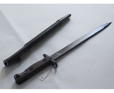Bayonet: A good India Pattern MKII short SMLE bayonet. Unfullered blade 12". Ricasso marked N.W.R. (North Western Railway) & 