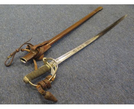 Sword: A good 1821 Pattern Light Cavalry Pattern Officers Sword. Blade 33'', top flat marked ''London Made''. George V cypher