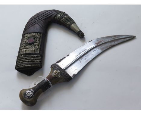 Arabian styled old Jambiya dagger, wooden handle, leather scabbard and silver decoration, with silver coins ? to handle