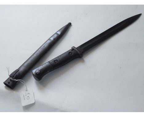 Bayonet: Imperial German Model 1885/98 knife bayonet. Wood grips, blade 10" by Richard Herder. Solingen. Dated 'W over 17' (1