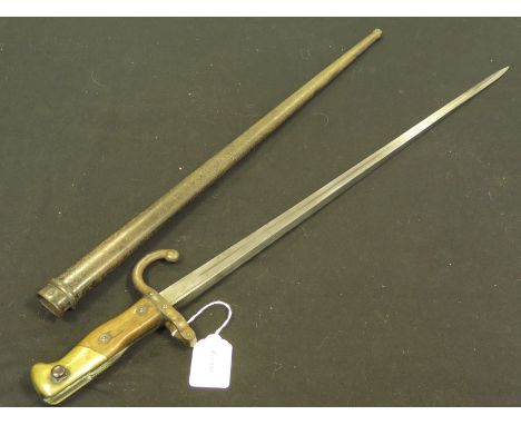 Bayonet: French Model 1874 Gras Epee bayonet in its steel scabbard. Made at St Etienne in 1877. Good overall condition with l
