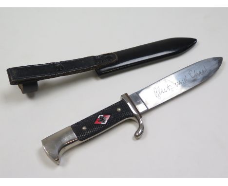 German Hitler Youth Dagger with metal scabbard and leather strap. Blade maker marked 'Hartkopf & Co Solingen, Ges Geschutzt, 