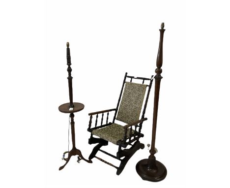 Early 20th century mahogany standard lamp, leaf carved and on turned base, (H157cm) together with another standard lamp (H145