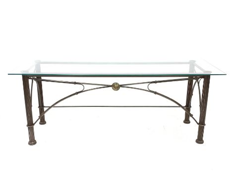 Wrought metal console table, the glass top over reeded cylindrical supports with bowed stretchers Dimensions: Height:&nbsp;71