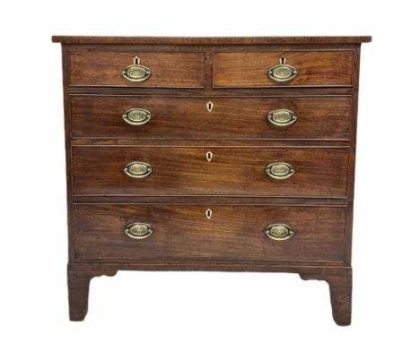 George III mahogany chest fitted with two short and three long cock beaded drawers with plate brass pull handles and ivory es
