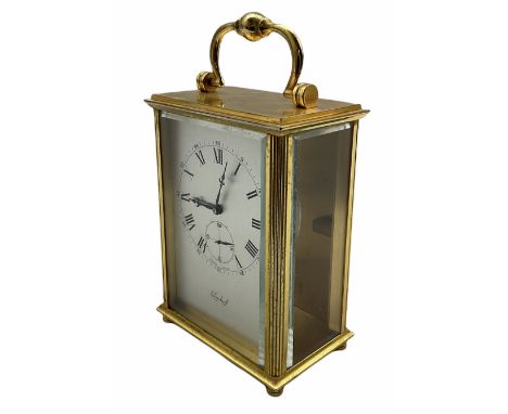 A 20th century Swiss carriage clock with a 15 jewel Imhof movement, lever escapement, integral winding key, wound and set fro