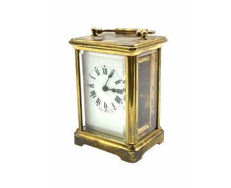 A late 19th century French Corniche cased 8-day timepiece carriage clock with a jewelled lever platform escapement, overcoil 