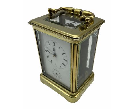 A late 19th century French Corniche cased carriage clock with alarm sounding on a bell, eight-day timepiece movement with a p