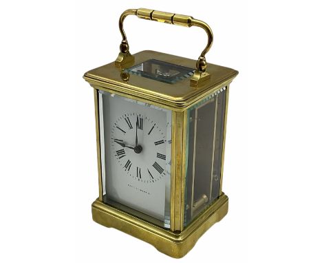 A 20th century Corniche cased 8-day timepiece carriage clock with a seven jewelled lever platform escapement with timing scre