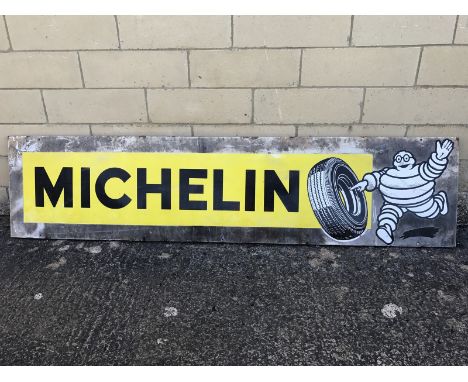 A Michelin rectangular enamel sign with Mr. Bibendum pictorial image to one side, 77 1/4 x 18 1/4". 