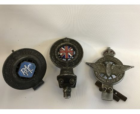 A Royal Automobile Club Associate car badge no. CZS1115, one other with central powder blue enamel centre and a Civil Service