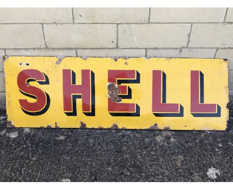 A rectangular Shell enamel sign, with unusual lettering, 58 1/4 x 19".