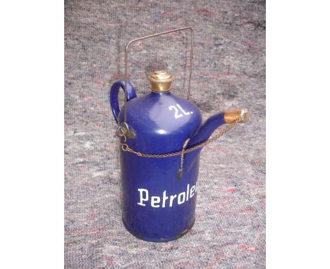 A two litre engine priming tap filling kettle in cobalt blue enamel circa 1899.