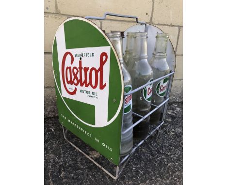 A Wakefield Castrol Motor Oil nine bottle forecourt crate with enamel sign to each end containing nine correct Castrol bottle