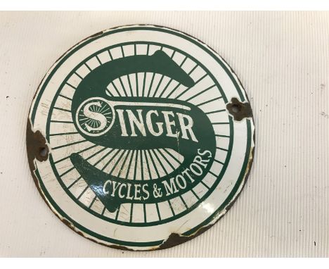 A small reproduction Singer Cycles and Motors circular enamel plaque, 4" diameter.