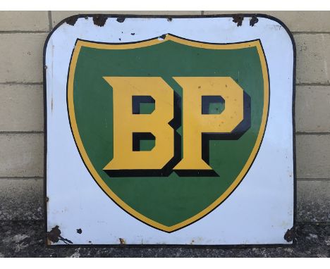A BP double sided enamel sign with shield motif to the centre, 29 1/2 x 27 1/2".