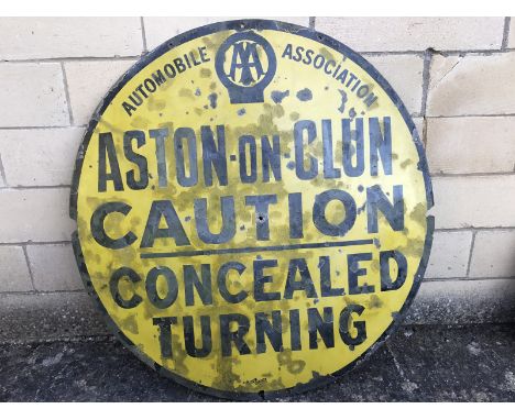 A large AA village enamel sign for Aston-on-Clun 'Caution Concealed Turning', by Jordan of Bilston, 36" diameter. 