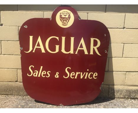 A Jaguar Sales and Service enamel sign with good gloss, 38 1/2 x 40 1/2".