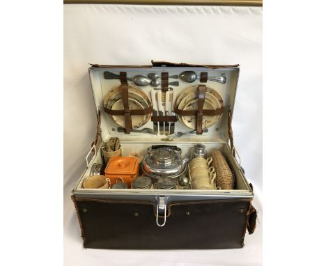 A good Garrison four person picnic set, in original tin trunk with canvas covering, the fitted interior with twin handled tra