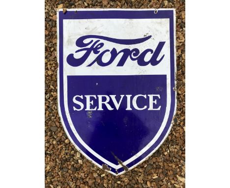 A Ford Service shield shaped enamel sign, 23 3/4 x 33 1/2".
