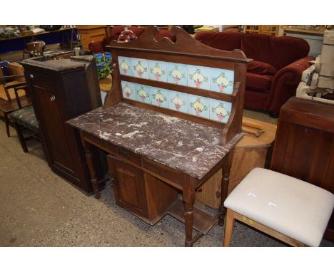 A early 20th Century marble topped and tile backed wash stand