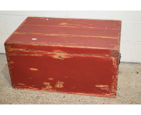 A red painted pine trunk