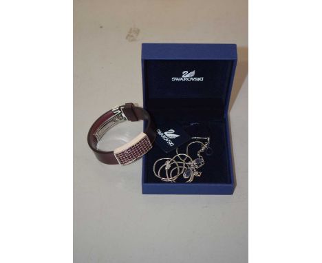 A Swarovski bangle and necklace