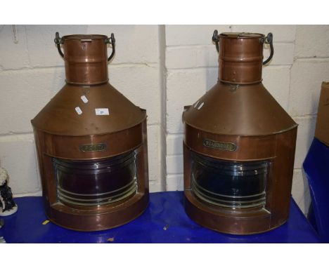 A large copper ships light marked Port together with a further corresponding item marked Starboard
