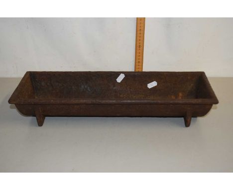 A vintage metal trough