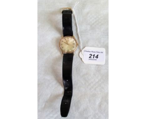 A gent's Omega 9ct gold wristwatch, with circular champagne dial, baton numerals, sweep second hand and date adjust at 3 o'cl