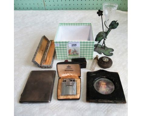 A collection of miscellaneous items, to include: a heavy silver cigarette case, decorative Morocco covered frame, small filig