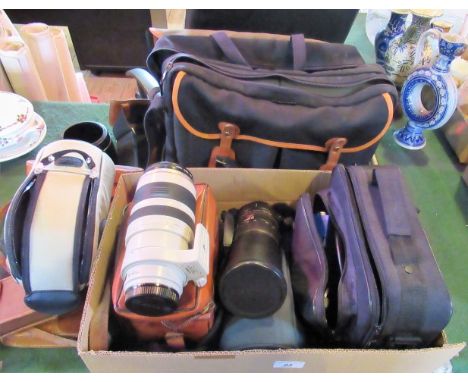 A collection of camera equipment, to include: a Canon EFL IS 100-400mm zoom lens MK1, corresponding case and other items.