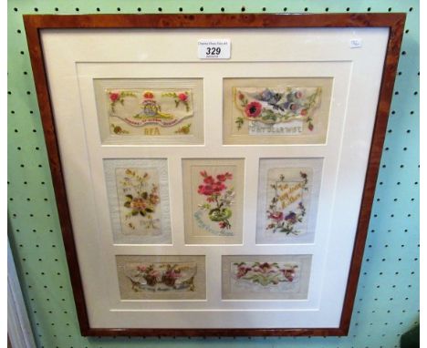 A collection of seven first world war silk woven postcards, one bearing the arms of the Royal Field Artillery.