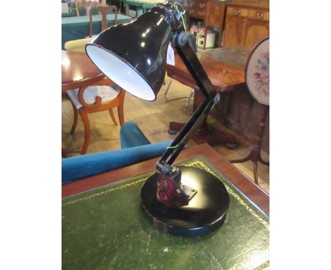 A vintage black Japanned industrial art machinist lamp with heavy swivel base.