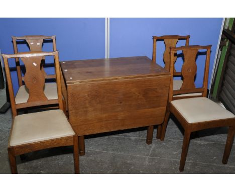 'Owl Man' oak drop leaf dining table (with spare set of legs) and a set of four dining chairs with drop light tan leather uph