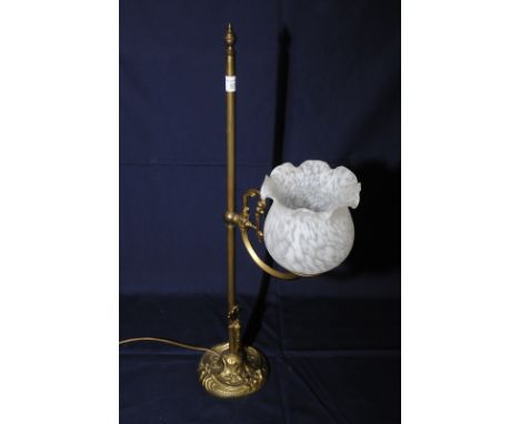 Early 20th C brass lamp with embossed base and uplifting shade 