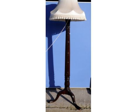 Quality large fluted mahogany standard lamp on three out splayed supports with carved detail 