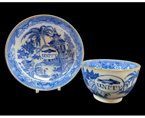 AN EARLY SWANSEA EARTHENWARE UNITY SUGAR BASIN & SAUCER, circa 1810-1820, printed in the transfer pattern known as 'Cambrian 