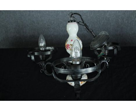 A Continental style steel and ceramic three branch chandelier. H.34 W.46cm. 