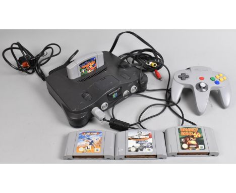 A Nintendo 64, Complete with Controller and Four Games to include Banjo and Kazooie, Donkey Kong, Star Wars and F-1 World Gra