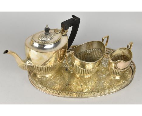 A Silver Plated Three Piece Tea Service to comprise Teapot, Sugar Bowl and Jug together with an Oval Galleried Tray