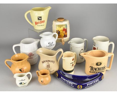 A Collection of Various Ceramic Advertising Jugs to Comprise Mackinlay's, White Horse etc