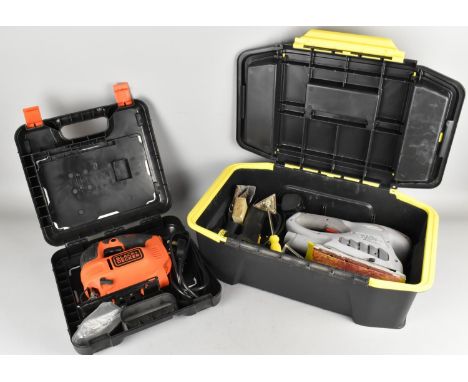 A Black and Decker in Box together with a Sander