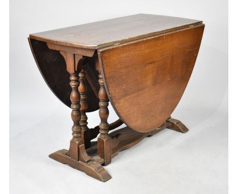 A Drop Leaf Gate Leg Dining table, 106cms Wide