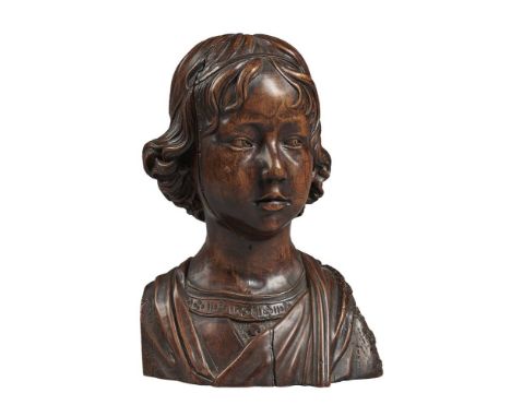 A Continental carved wood bust of a boy, possibly the young Christ, after Andrea della Robbia (1435-1525), probably 19th cent