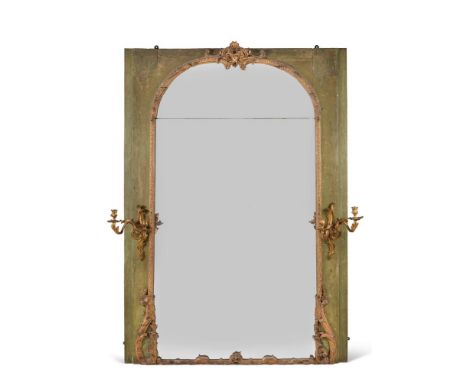 A green painted and parcel gilt wall mirror, circa 1750 and later, the arched mirror plate within a gilt composition surround
