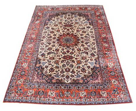 A Tabriz carpet, approximately 426 x 307cmCondition Report: Some wear but carpet generally maintains good pile overall. Pale 