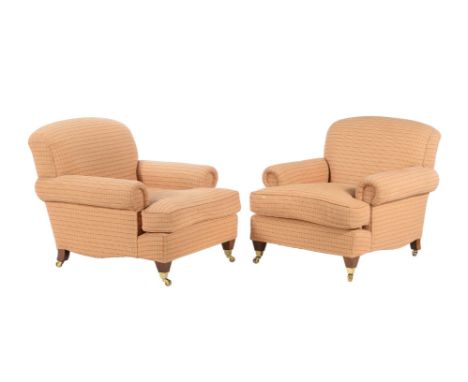 A pair of upholstered armchairs in the manner of George Smith, of recent manufacture, with brass caps and castors, 89cm high,