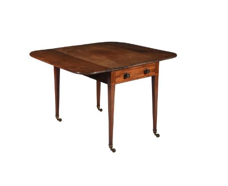 Y A George III mahogany Pembroke games table, circa 1790, the top with drop flaps above a full length drawer fitted and inlai